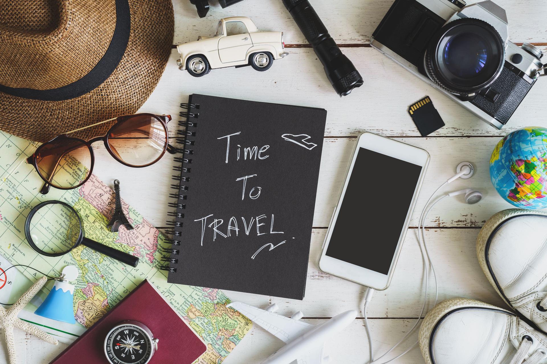 Traveler's accessories and items with black notebook